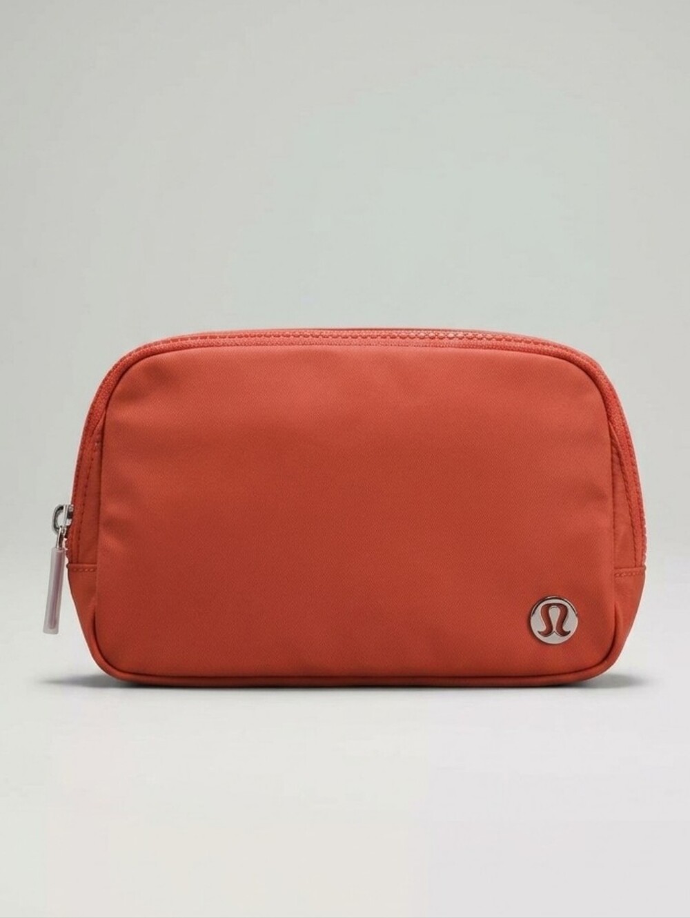 Lululemon Everywhere Belt Bag in Cherry Ember and Silver.